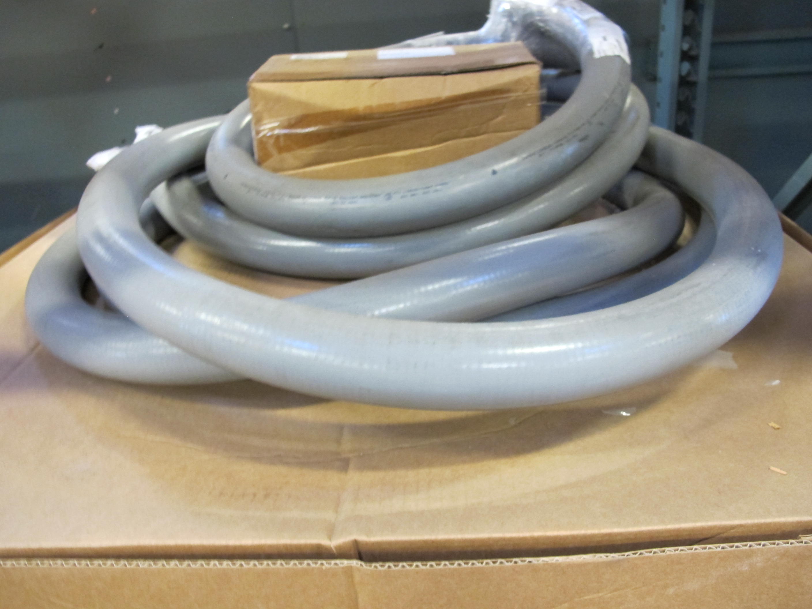 LOT TO INCLUDE: (3 PALLET) MISC. HOSING AND TUBING, PIG TAIL LEADS, ANACONDA 2" SEALING, FLEXIBLE TUBING . LOADING & HANDLING FEE $15-4546